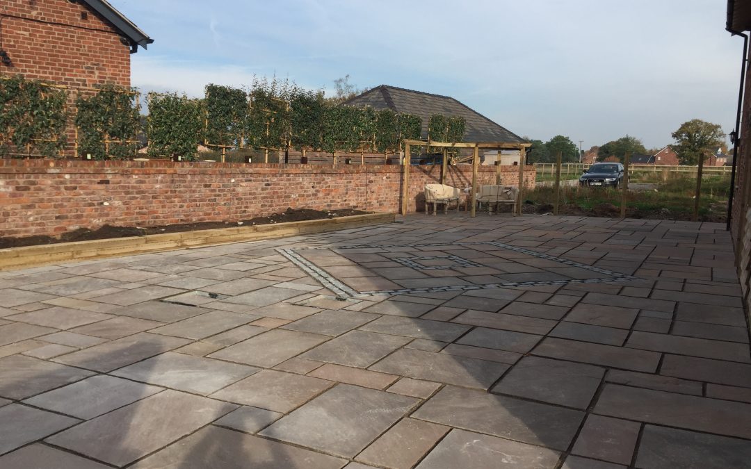 Bespoke Indian Stone Patio Detailed With English Cobble